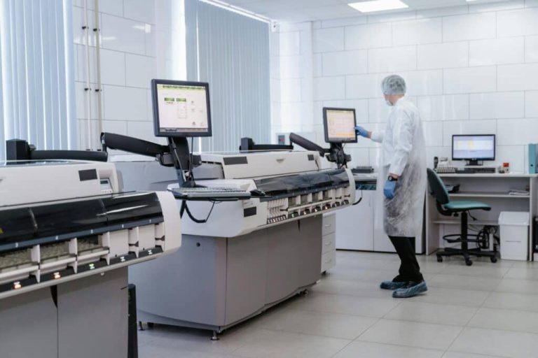 Researcher working in a UK pharmaceutical or MedTech laboratory